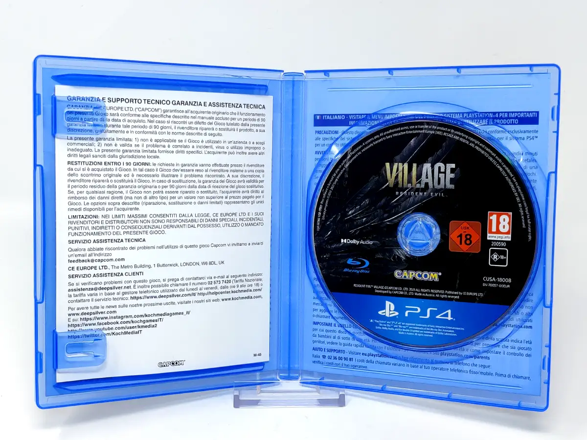 Interior del juego Resident Evil: Village (ESP) para PlayStation 4 con disco y manual
