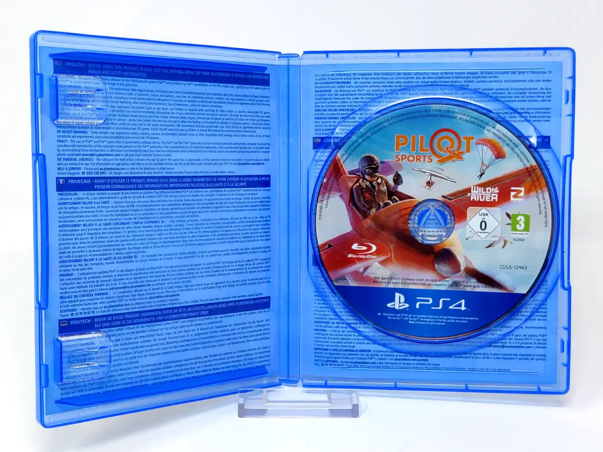 Interior del juego Pilot Sports (ESP) para PlayStation 4 con disco y manual