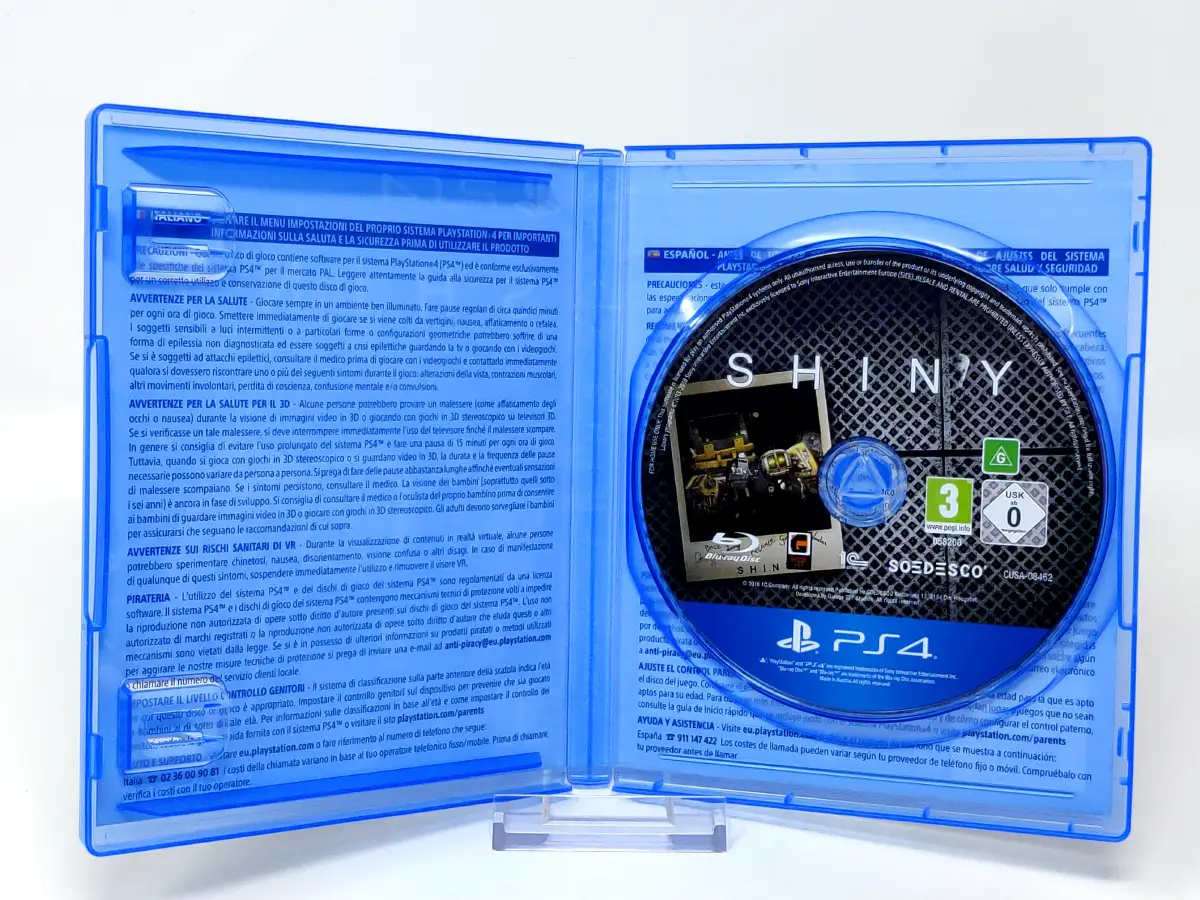 Interior del juego Shiny (ESP) para PlayStation 4 con disco y manual