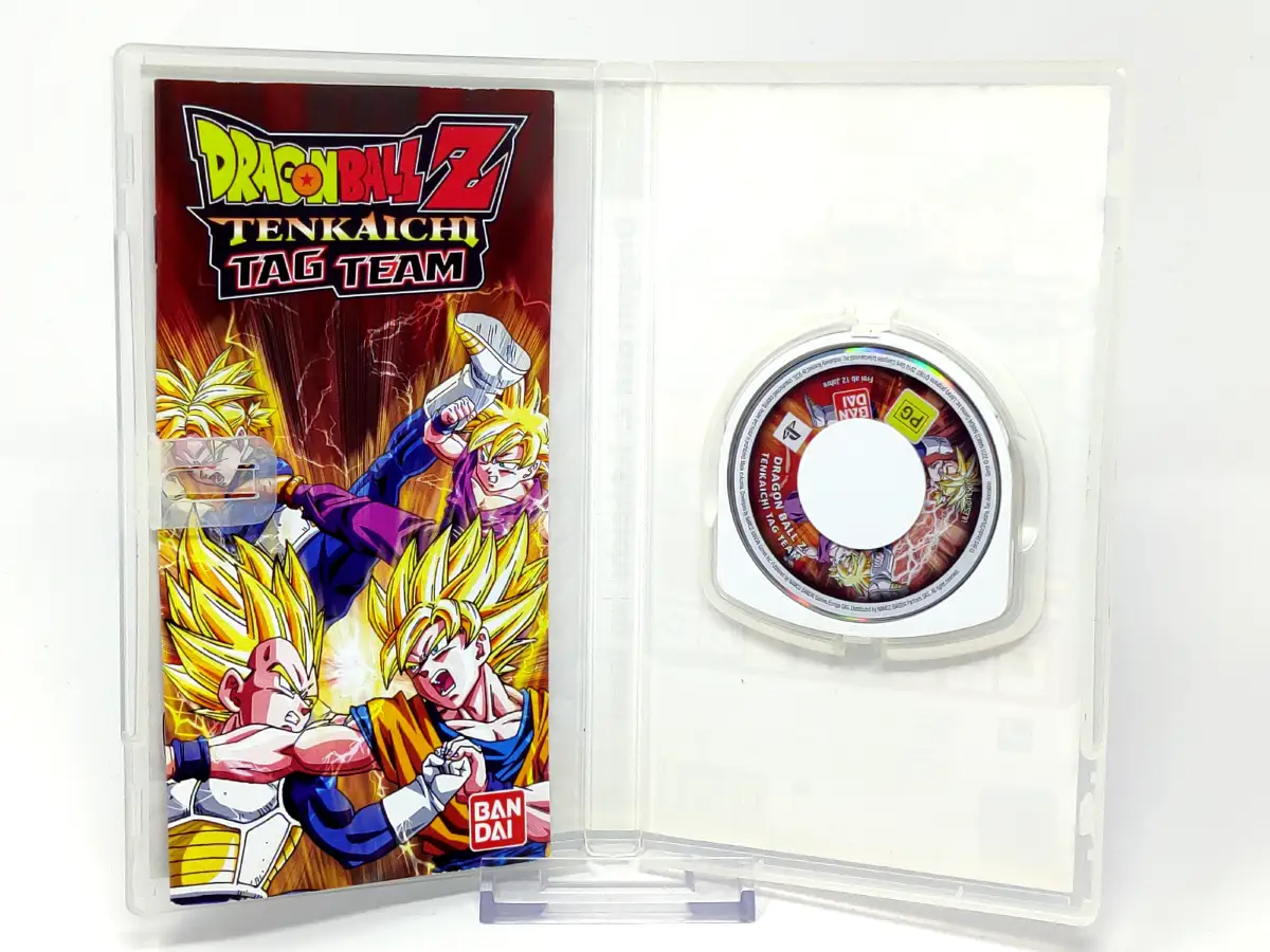 Interior del juego Dragon Ball Z: Tenkaichi Tag Team (ESP) para PSP con disco y manual