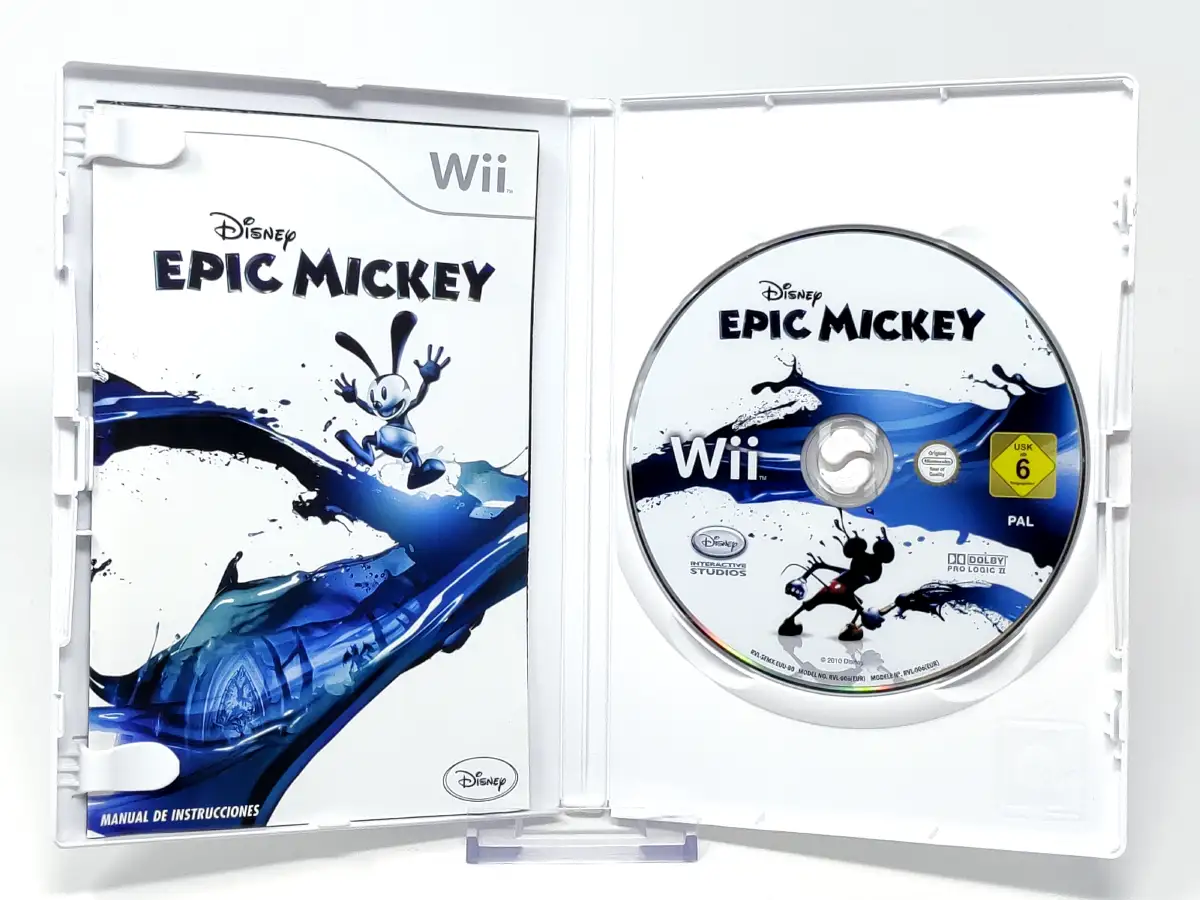 Interior del juego Disney Epic Mickey (ESP) para Nintendo Wii con disco y manual