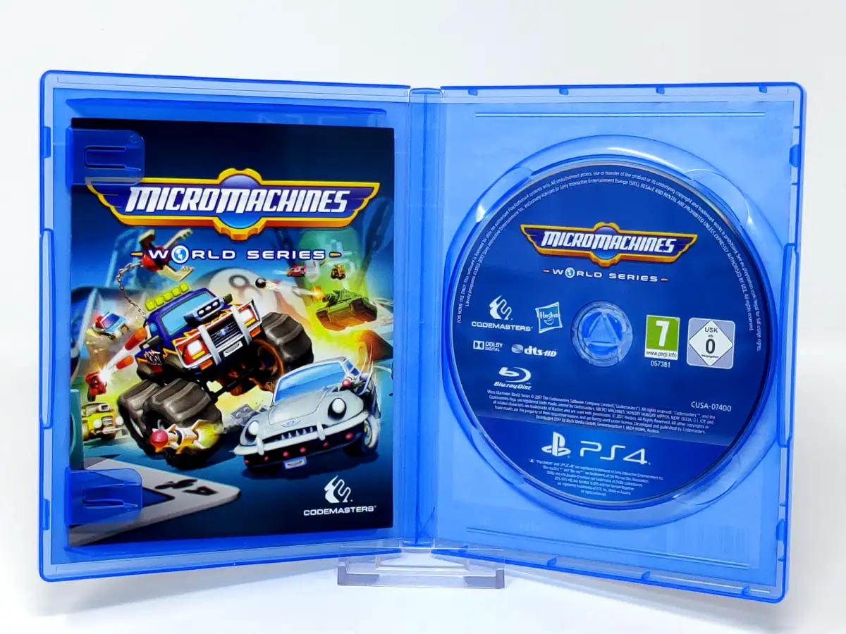 Interior del juego Micro Machines World Series (ESP) para PlayStation 4 con disco y manual