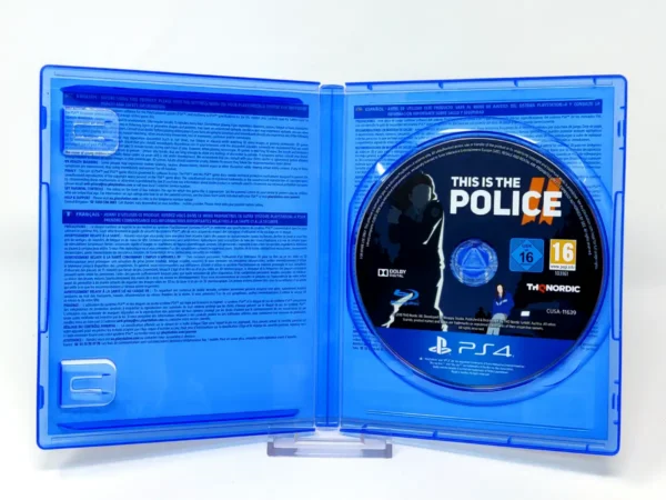 Interior del juego This Is the Police 2 (ESP) para PlayStation 4 con disco y manual