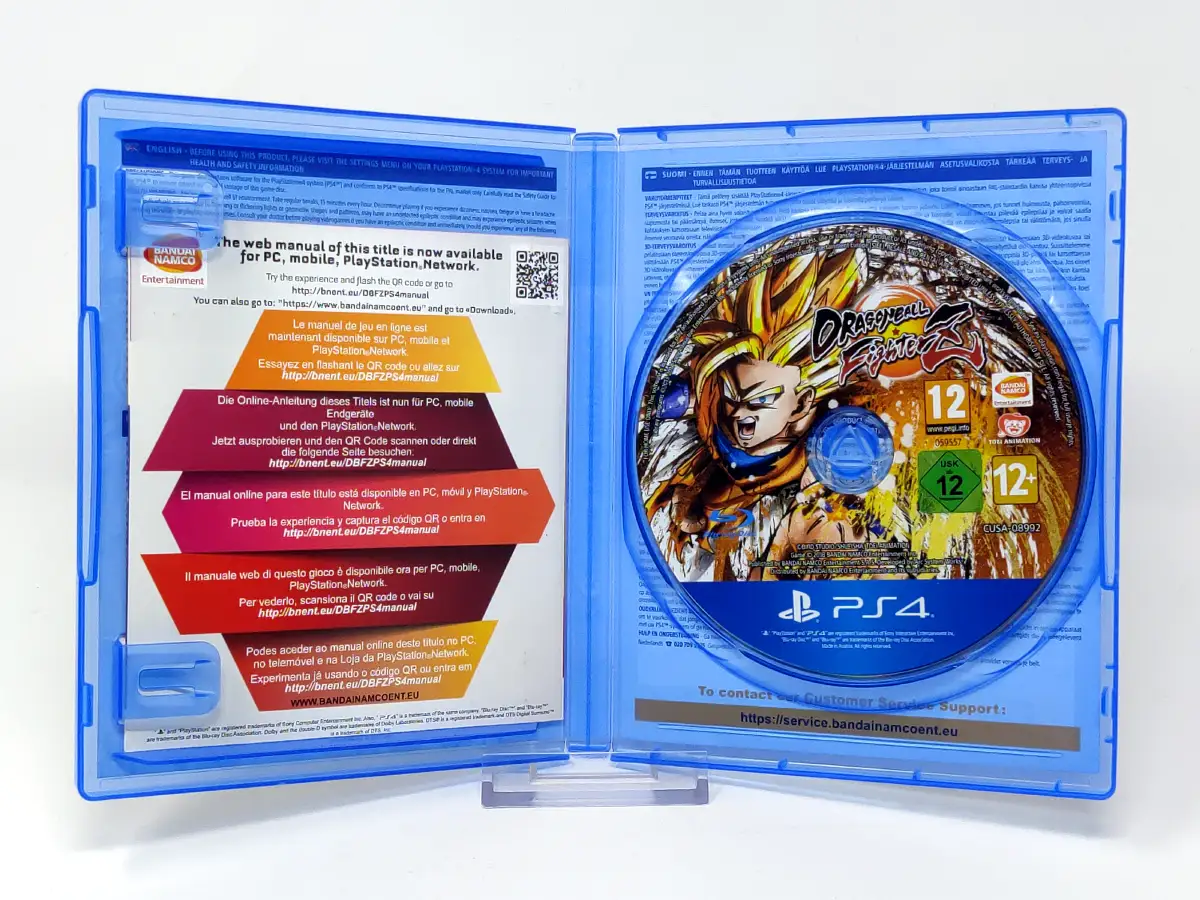 Interior del juego Dragon Ball Fighter Z (EUR) para PlayStation 4 con disco y manual