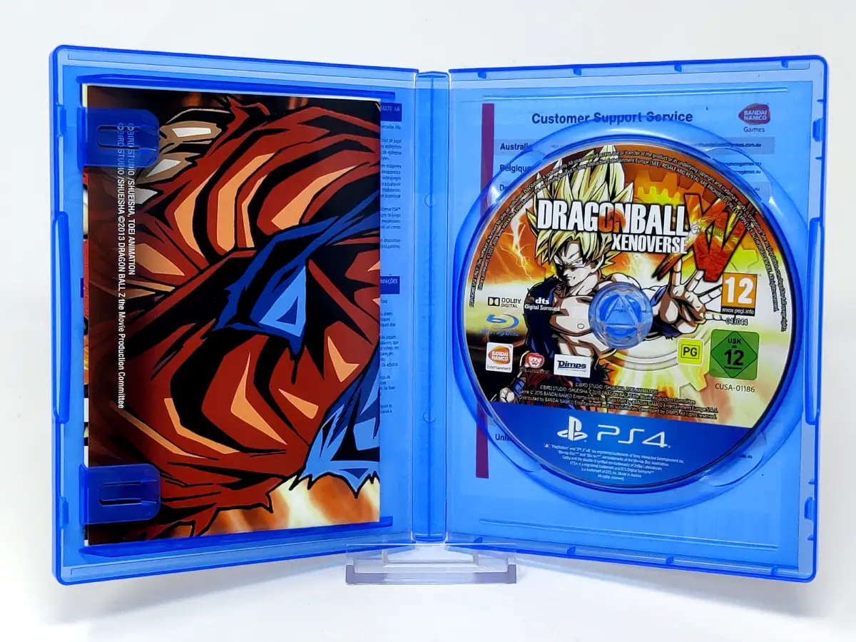 Interior del juego Dragon Ball Xenoverse (ESP) para PlayStation 4 con disco y manual