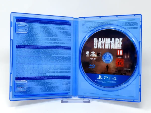 Interior del juego Daymare 1998 (ESP) para PlayStation 4 con disco y manual
