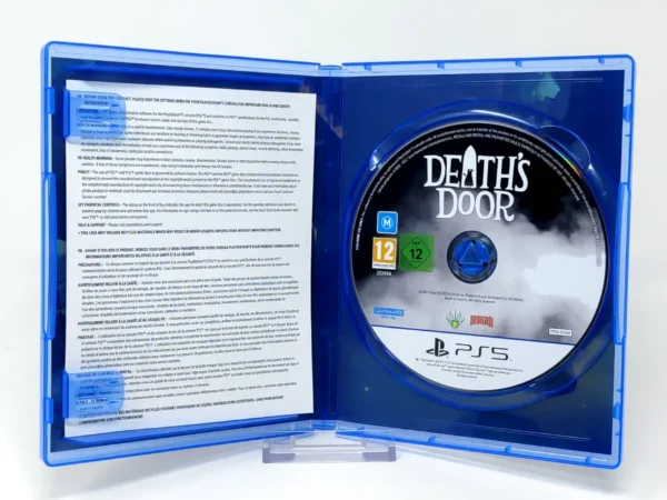 Interior del juego Death's Door (ESP) para PlayStation 5 con disco y manual