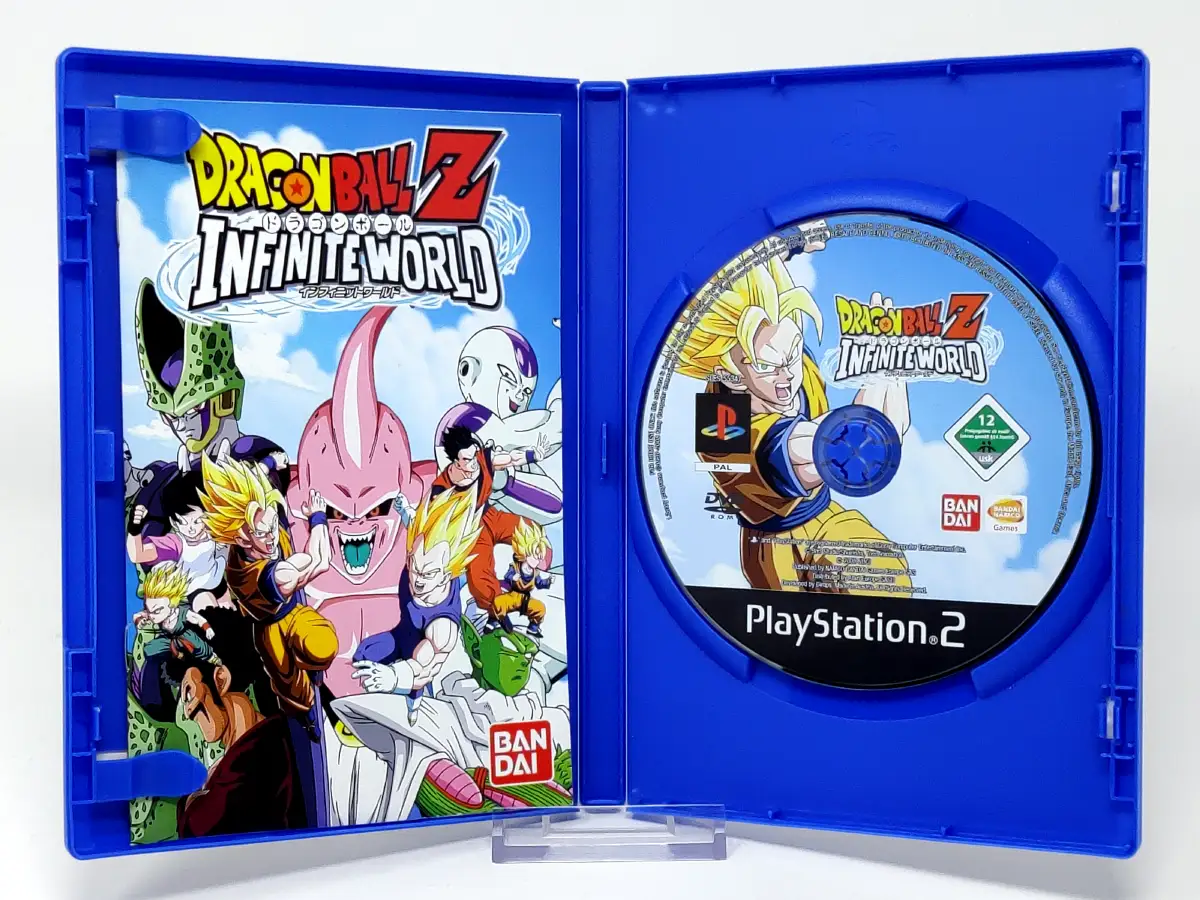 Interior del juego Dragon Ball Z: Infinite World (ESP) para PlayStation 2 con disco y manual
