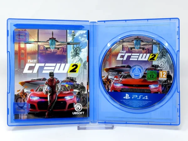 Interior del juego The Crew 2 (Deluxe Edition) (ESP) para PlayStation 4 con disco y manual