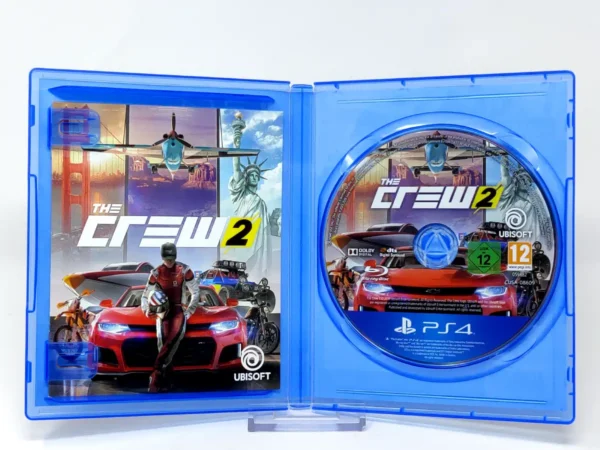 Interior del juego The Crew 2 (ESP) para PlayStation 4 con disco y manual
