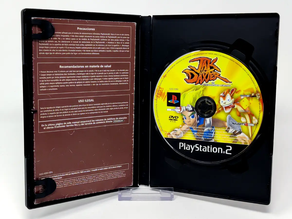 Interior del juego Jak and Daxter: El Legado de los Precursores (ESP) (Rebajado) para PlayStation 2 con disco y manual
