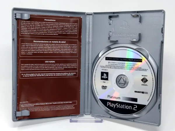 Interior del juego Jak and Daxter: El Legado de los Precursores (ESP) (Platinum) para PlayStation 2 con disco y manual