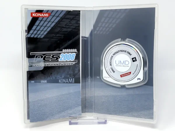 Interior del juego PES 2008: Pro Evolution Soccer (ESP) para PSP con disco y manual