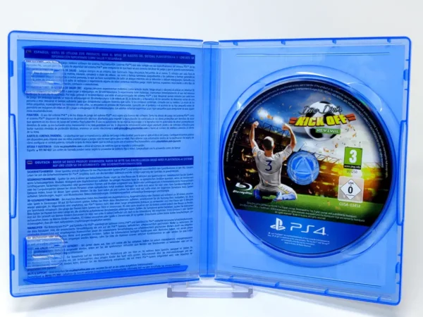 Interior del juego Dino Dini's Kick Off Revival (ESP) para PlayStation 4 con disco y manual