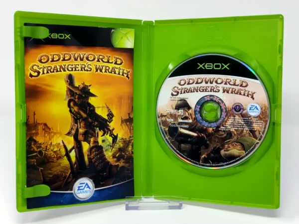 Interior del juego Oddworld: Stranger's Wrath (UK) para XBOX con disco y manual