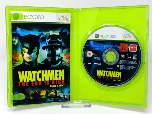 Interior del juego Watchmen: El Fin Está Cerca: Partes 1 y 2 (ESP) para XBOX 360 con disco y manual