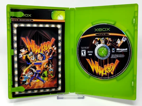 Interior del juego Whacked! (USA) para XBOX con disco y manual