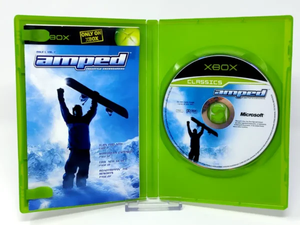 Interior del juego Amped: Freestyle Snowboarding (UK) (Classics) para XBOX con disco y manual