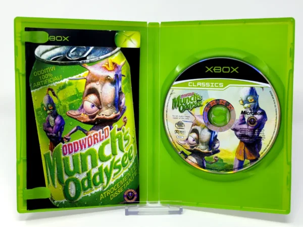 Interior del juego Oddworld: Munch's Oddysee (ITA) (Classics) para XBOX con disco y manual