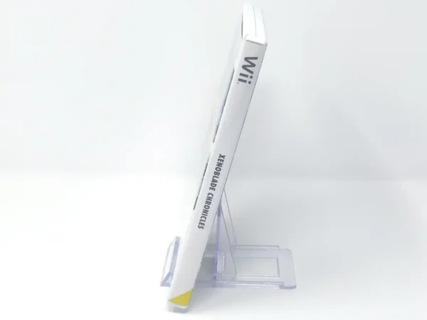 Lateral de la caja de Xenoblade Chronicles (ESP) para Nintendo Wii