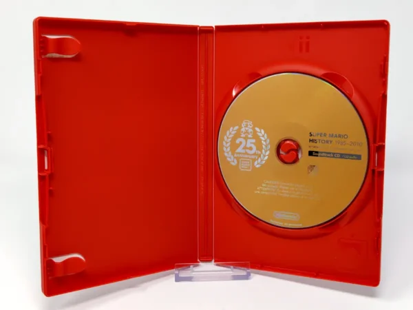 Interior del juego Super Mario History 1985-2010 (ESP) (Soundtrack CD) (Rebajado) para AUDIO-CD con disco y manual