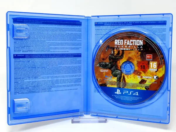 Interior del juego Red Faction Guerrilla Re-Mars-tered (EUR) para PlayStation 4 con disco y manual
