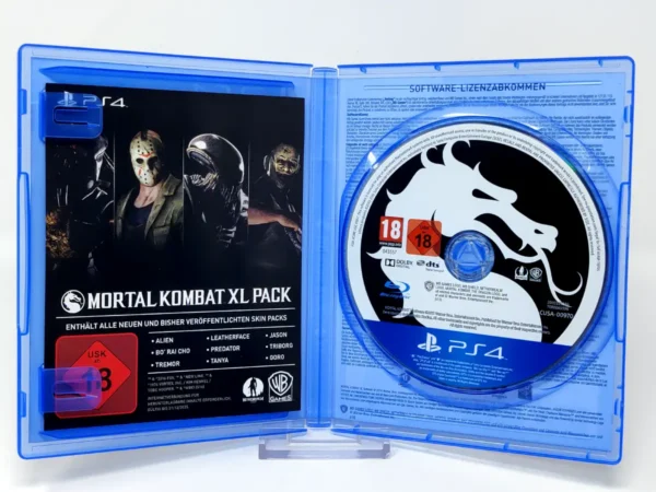 Interior del juego Mortal Kombat XL (ALE) para PlayStation 4 con disco y manual