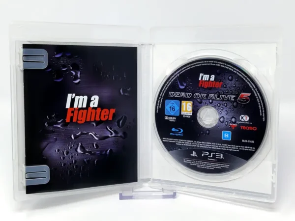 Interior del juego Dead or Alive 5 (ESP) para PlayStation 3 con disco y manual