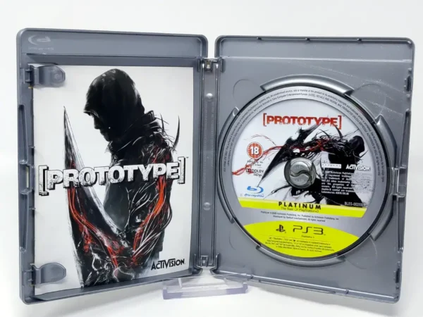 Interior del juego Prototype (UK) (Platinum) para PlayStation 3 con disco y manual
