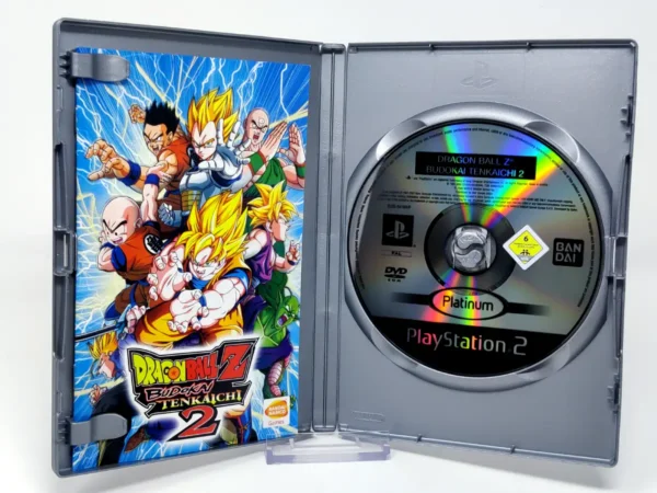 Interior del juego Dragon Ball Z: Budokai Tenkaichi 2 (ESP) (Platinum) para PlayStation 2 con disco y manual