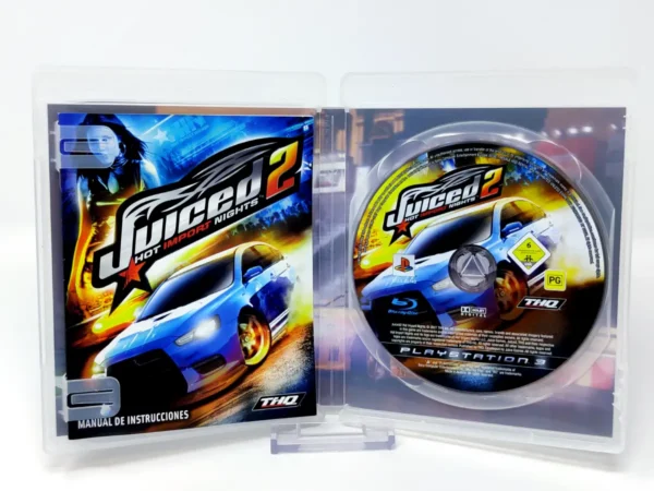 Interior del juego Juiced 2: Hot Import Nights (ESP) para PlayStation 3 con disco y manual