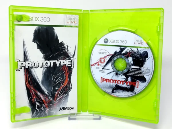 Interior del juego Prototype (FRA) para XBOX 360 con disco y manual