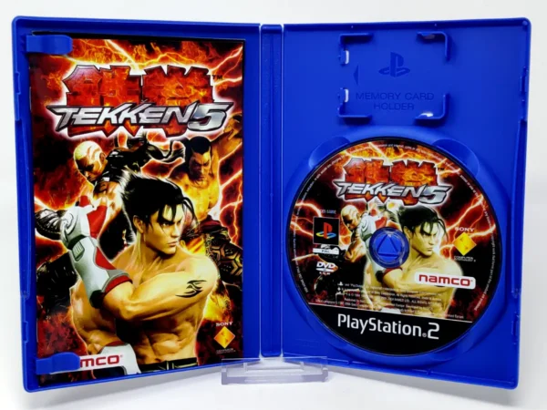 Interior del juego Tekken 5 (FRA) para PlayStation 2 con disco y manual