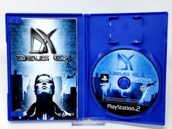 Interior del juego Deus Ex (FRA) para PlayStation 2 con disco y manual
