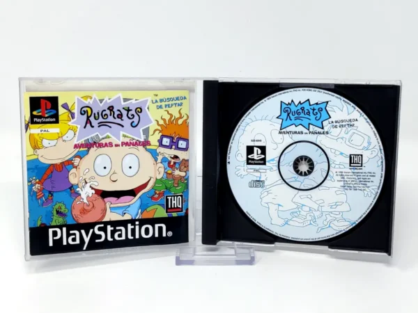 Interior del juego Rugrats: Aventuras en Pañales (ESP) para PlayStation 1 con disco y manual