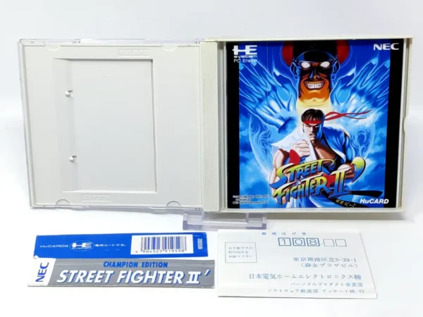 Interior del juego Street Fighter II': Champion Edition (JAP) para TurboGrafx-16 con disco y manual