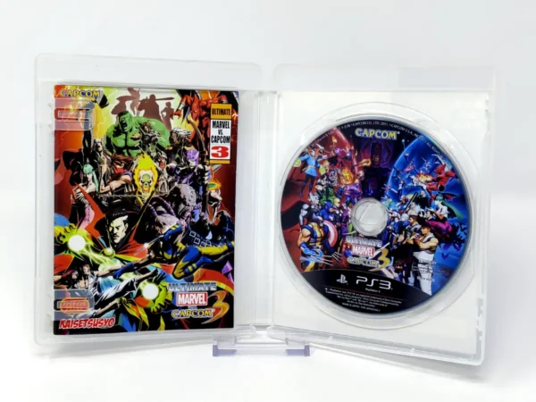 Interior del juego Ultimate Marvel vs. Capcom 3 (JAP) para PlayStation 3 con disco y manual