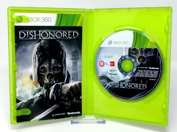 Interior del juego Dishonored (FRA) para XBOX 360 con disco y manual