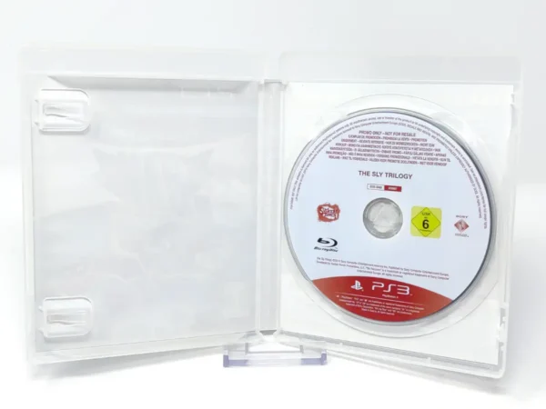 Interior del juego The Sly Trilogy (ESP) (Promo) para PlayStation 3 con disco y manual