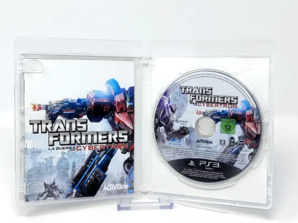 Interior del juego Transformers: La Guerra por Cybertron (ESP) para PlayStation 3 con disco y manual